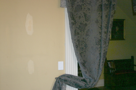 Mis-colored patch marks on walls. Notice my unfinished “drapes”?